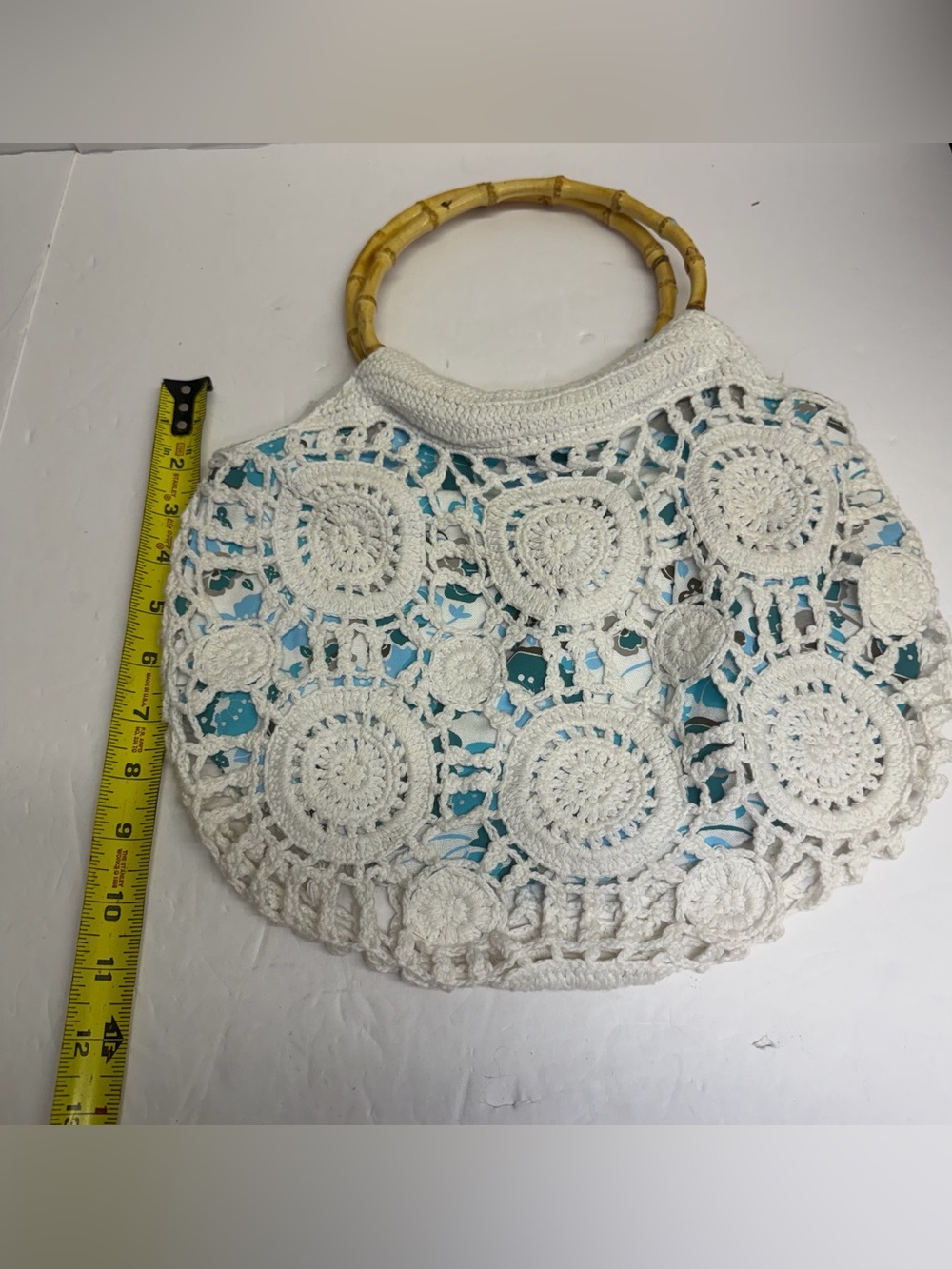 Lilu White Crochet Purse with teal and‎ gray floral underlay Bamboo Handles. - Picture 9 of 10